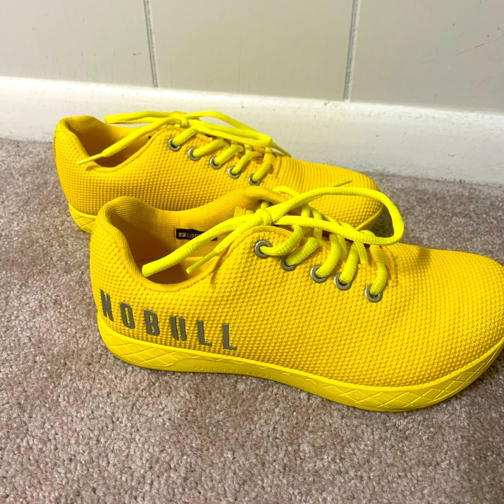 NOBULL Yellow Athletic Shoes Sleek Modern Design